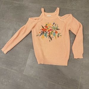 Cold shoulder sweater.